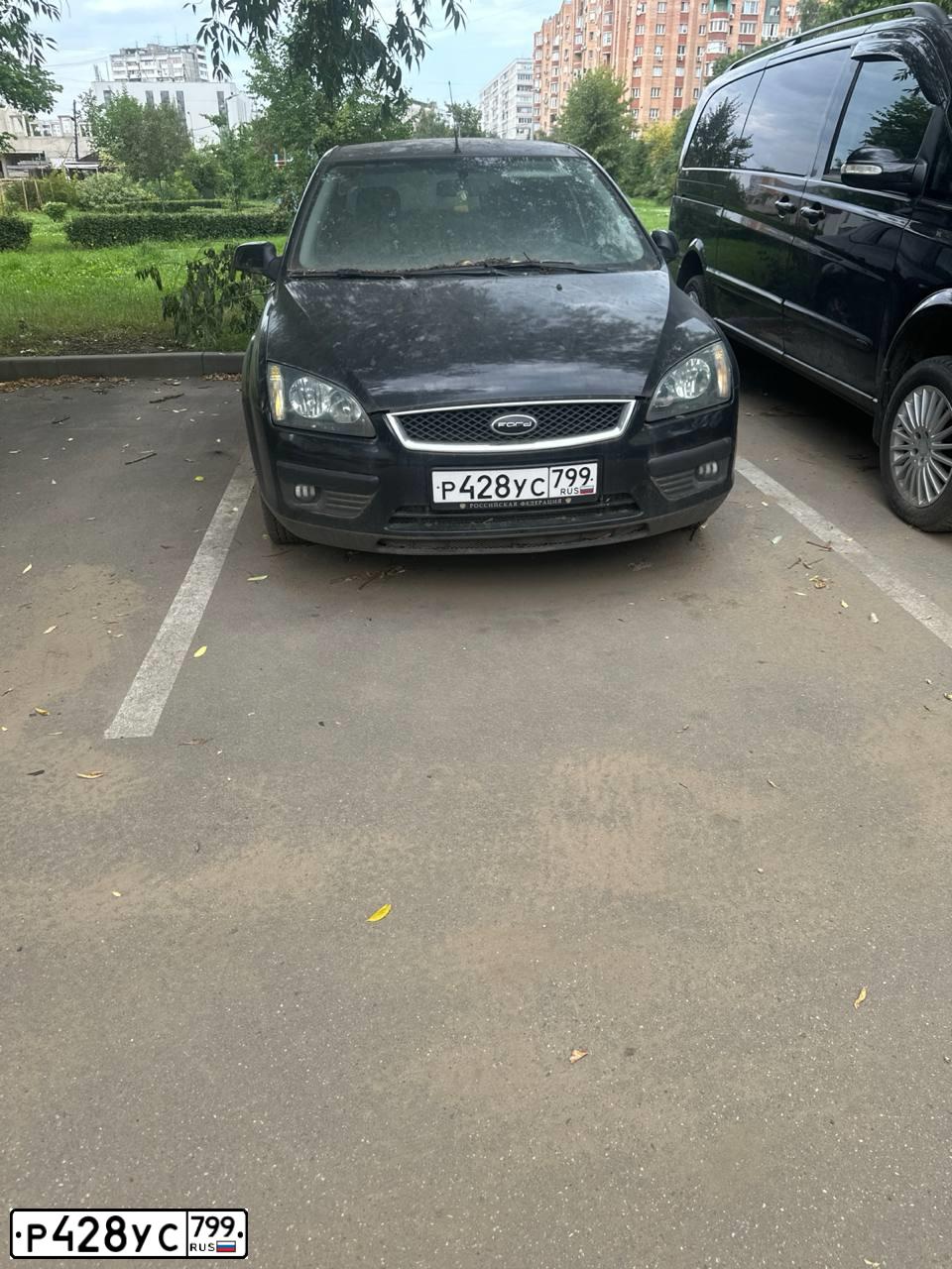Фото автомобиля FORD FOCUS, 2007 — госномер Р428УС799. Цвет: ЧЕРНЫЙ