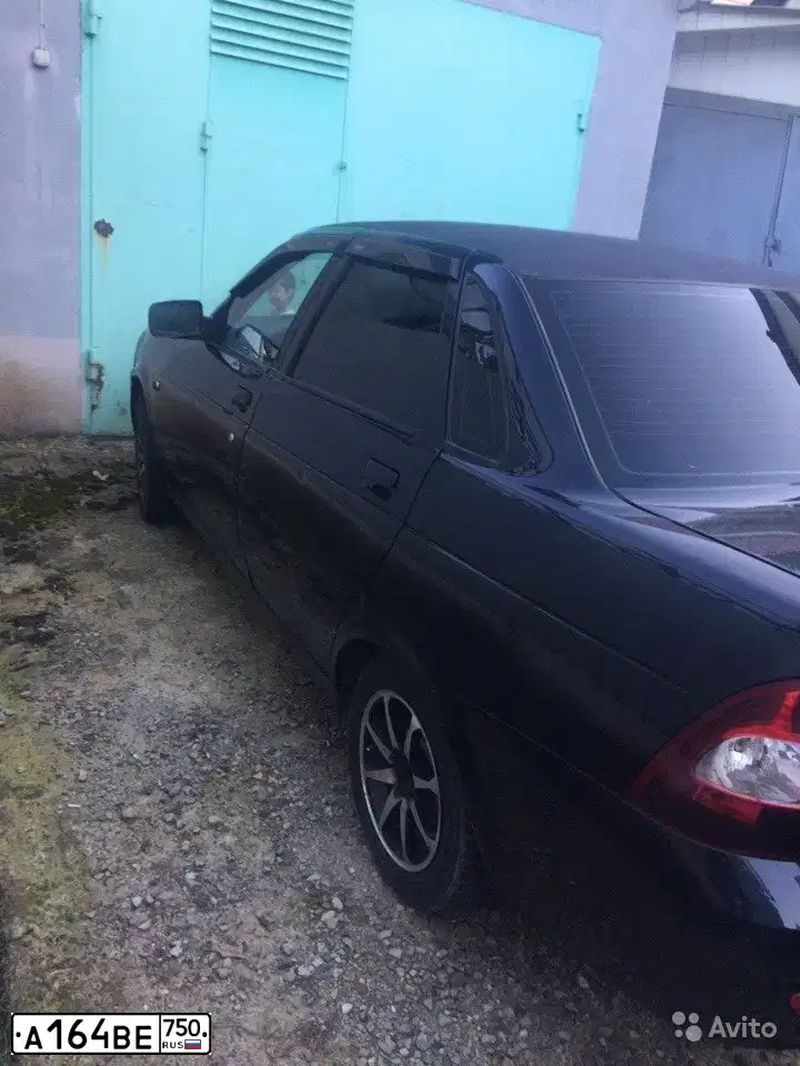 Фото автомобиля LADA PRIORA, 2010 — госномер Н361МТ126. Цвет: СИНЕ-ЧЕРНЫЙ