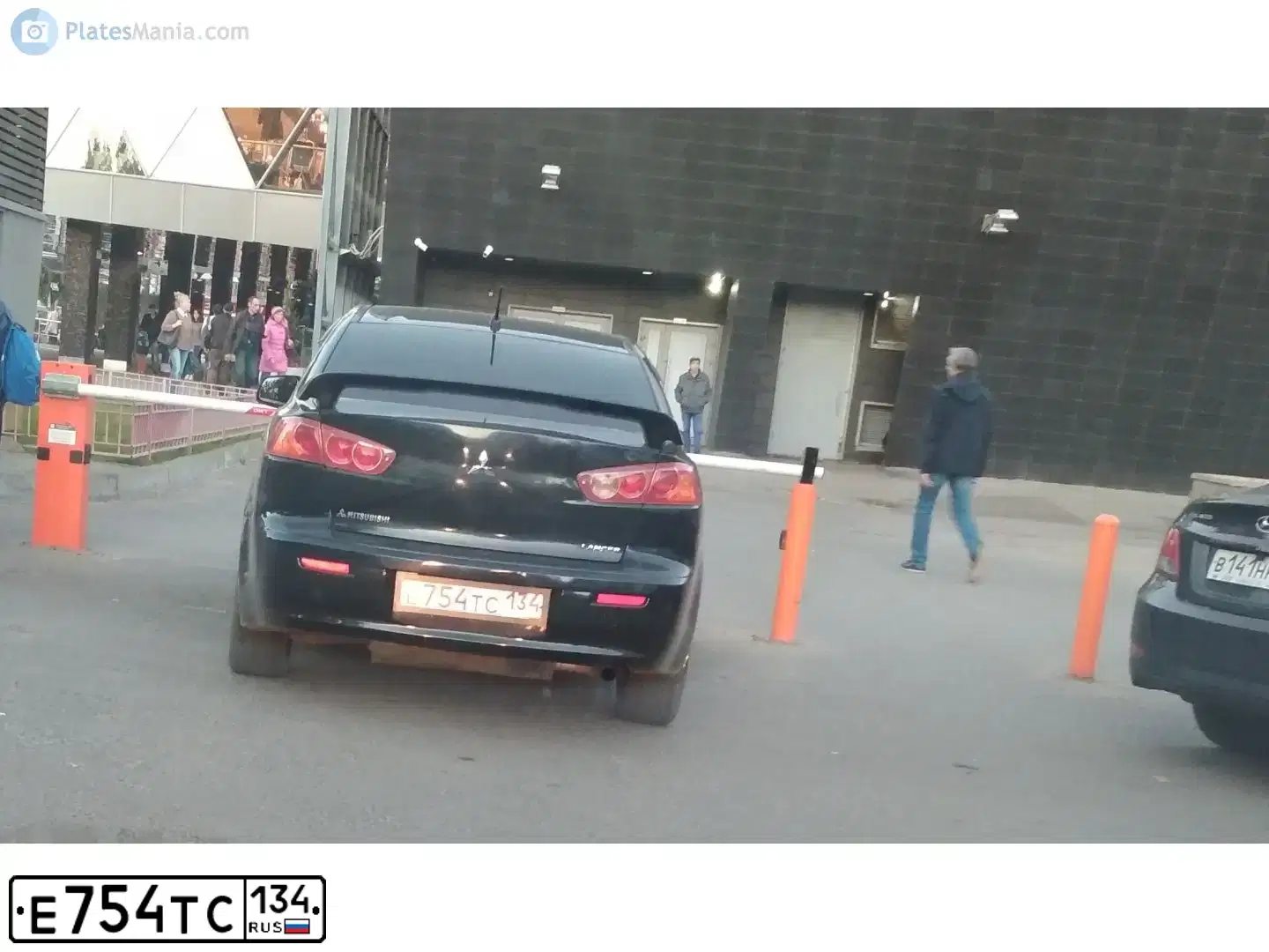 Фото автомобиля MITSUBISHI LANCER, 2008 — госномер М091ХА34. Цвет: ЧЕРНЫЙ