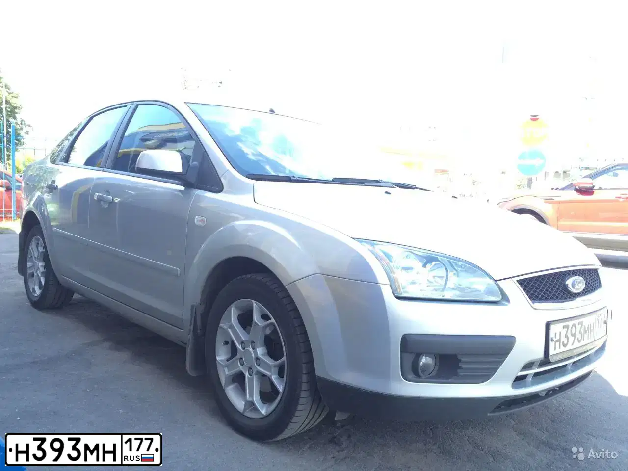 Фото автомобиля FORD FOCUS, 2006 — госномер Х220АЕ250. Цвет: СЕРЕБРИСТЫЙ