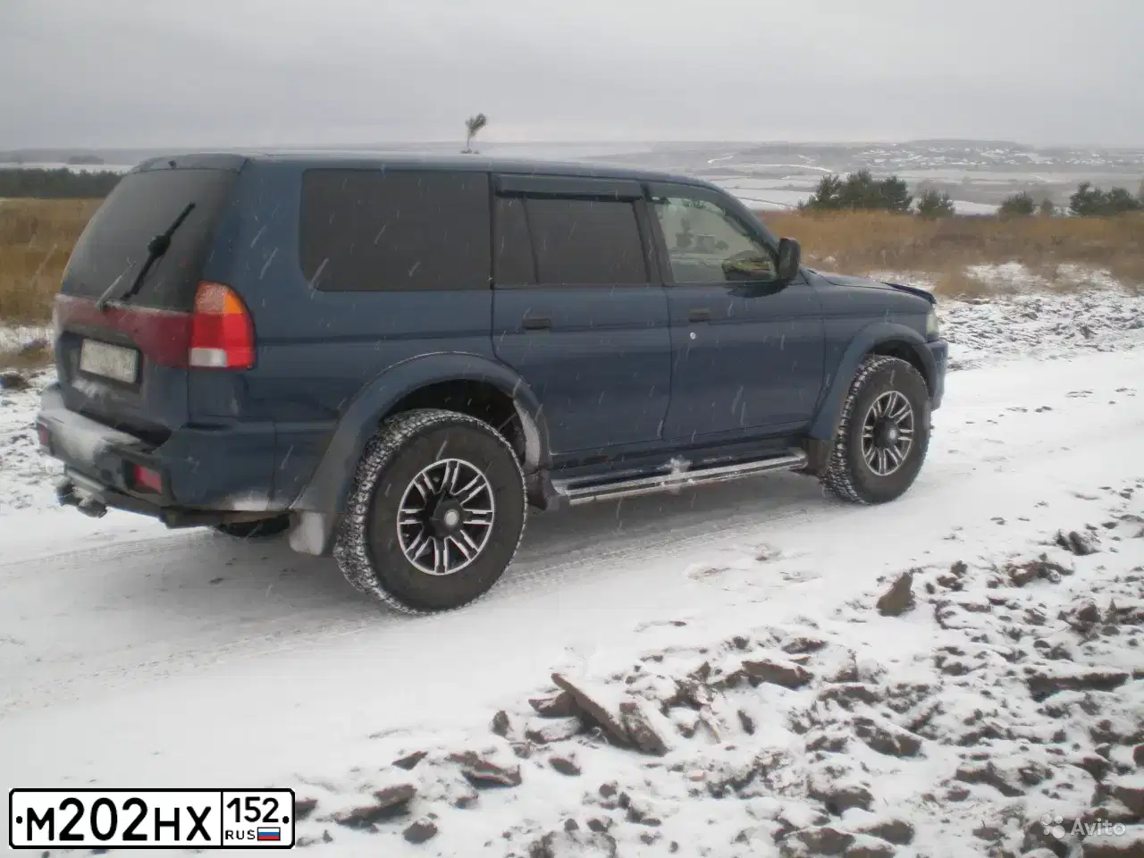 Фото автомобиля MITSUBISHI PAJERO SPORT, 1998 — госномер М202НХ152. Цвет: ТЕМНО-СИНИЙ