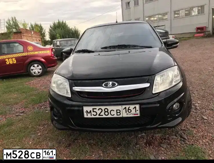 Фото автомобиля LADA 2190 GRANTA, 2014 — госномер Е196КМ07. Цвет: ЧЕРНЫЙ