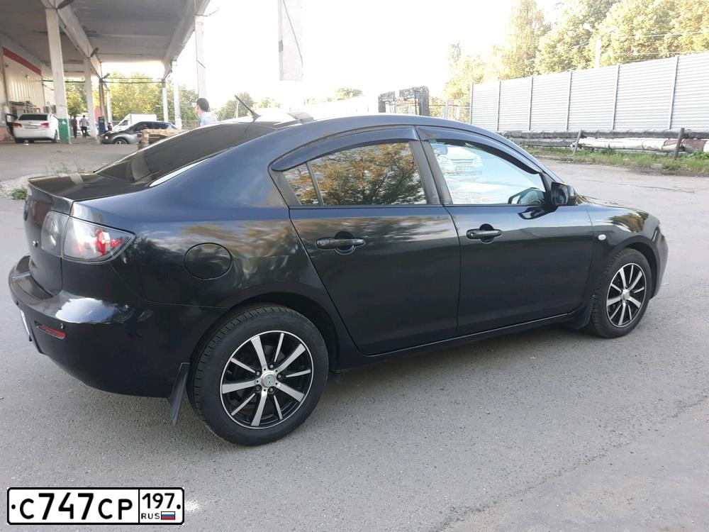 Фото автомобиля MAZDA 3, 2007 — госномер У390ОМ62. Цвет: ЧЕРНЫЙ