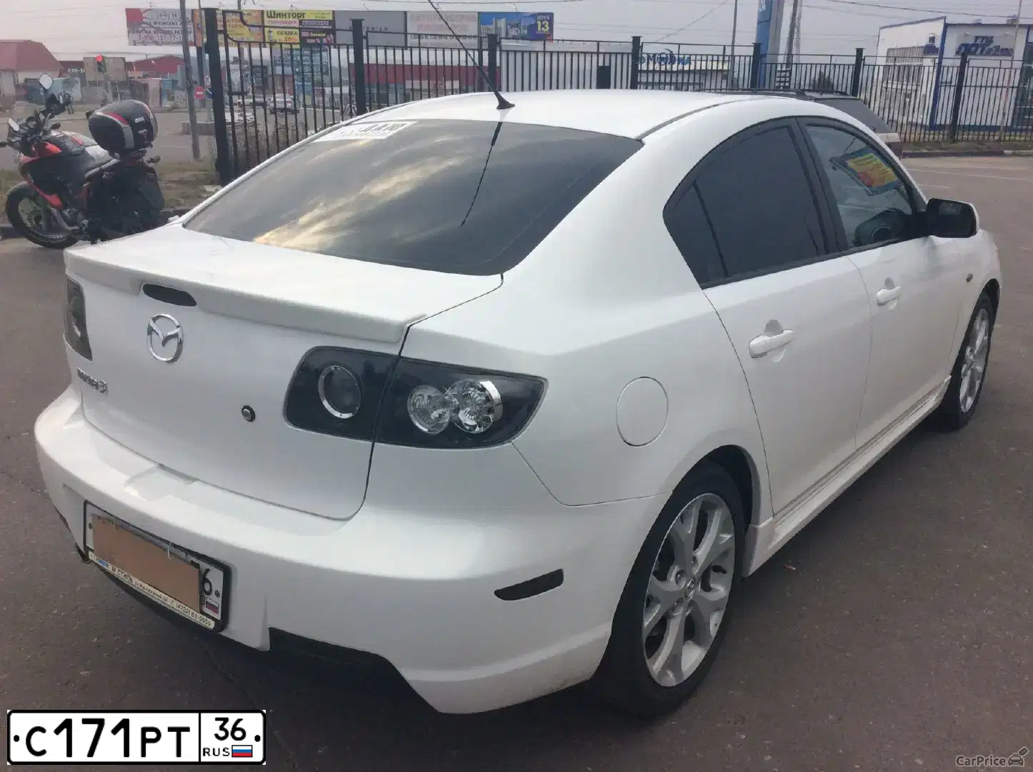 Фото автомобиля MAZDA 3, 2008 — госномер М039ВТ193. Цвет: Белый