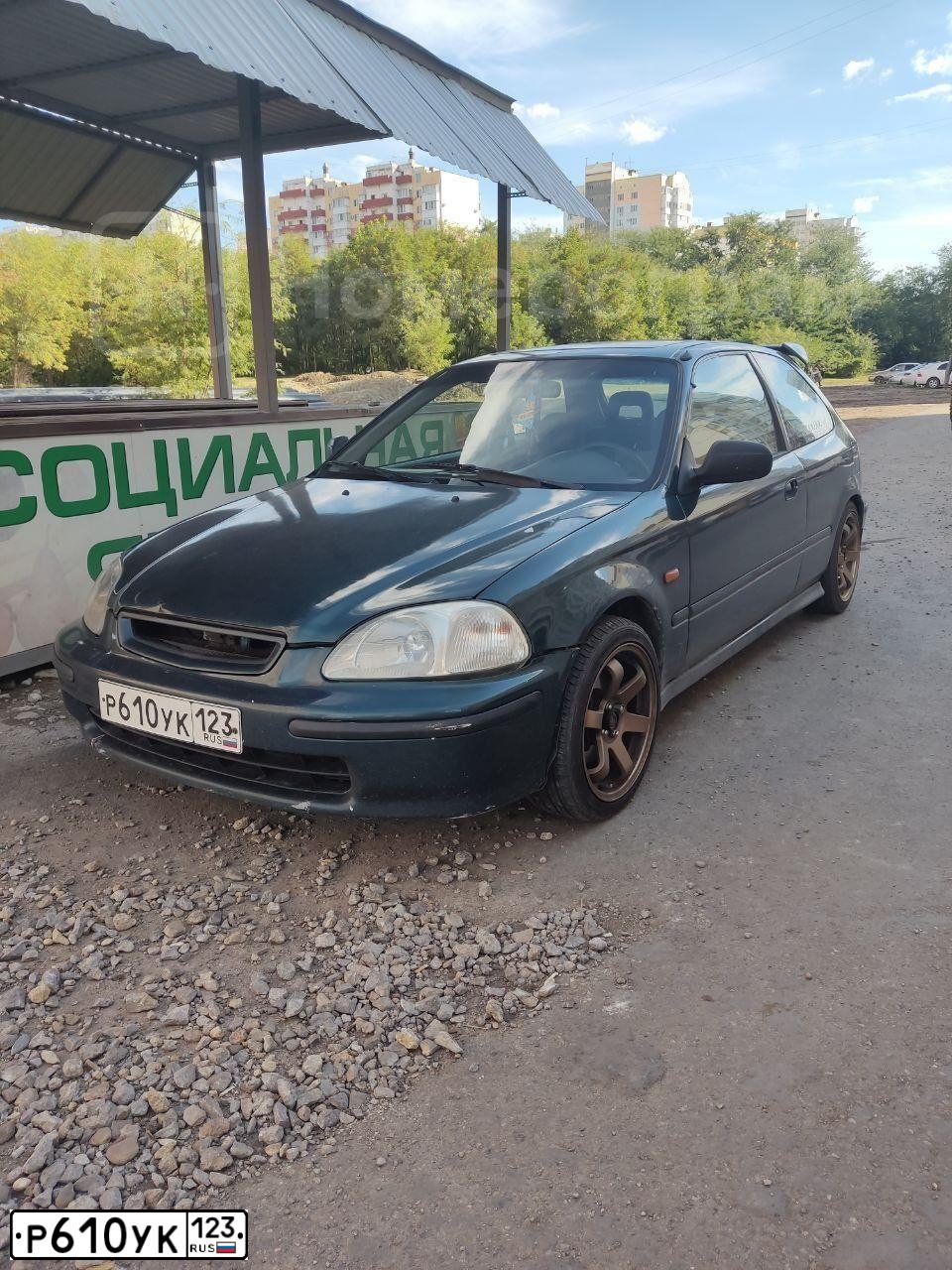 Фото автомобиля HONDA CIVIC, 1995 — госномер А752СВ34. Цвет: ЗЕЛЕНЫЙ