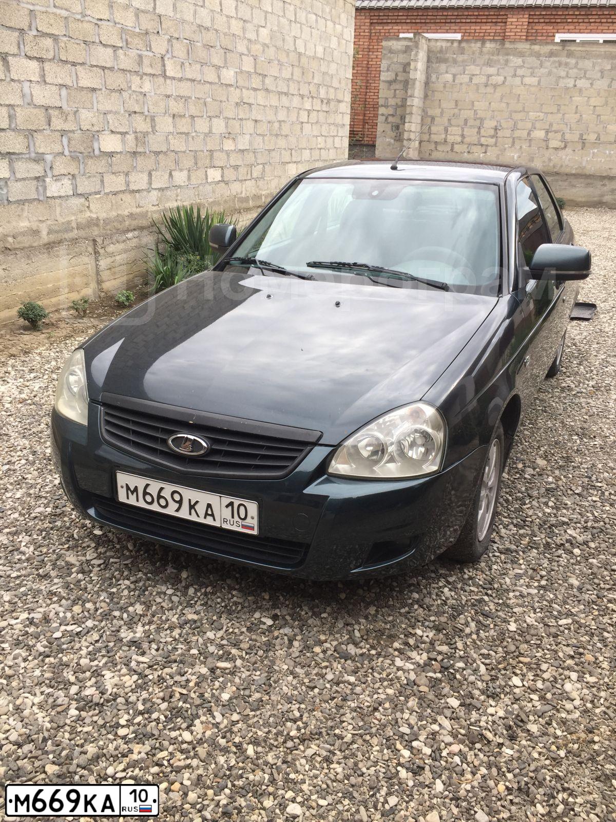 Фото автомобиля LADA 2172 PRIORA, 2013 — госномер М669КА10. Цвет: СРЕДНИЙ СЕРО-ЗЕЛЕНЫЙ МЕТ.