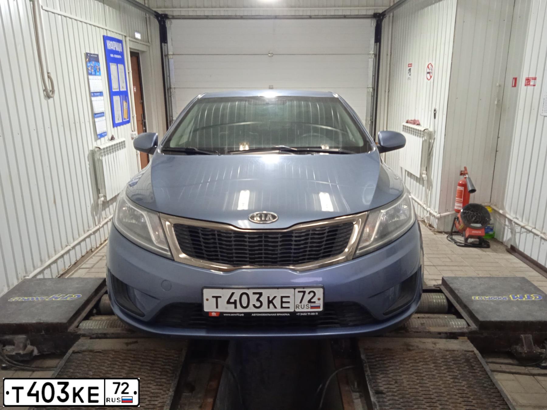 Фото автомобиля KIA RIO, 2012 — госномер Т403КЕ72. Цвет: ГОЛУБОЙ