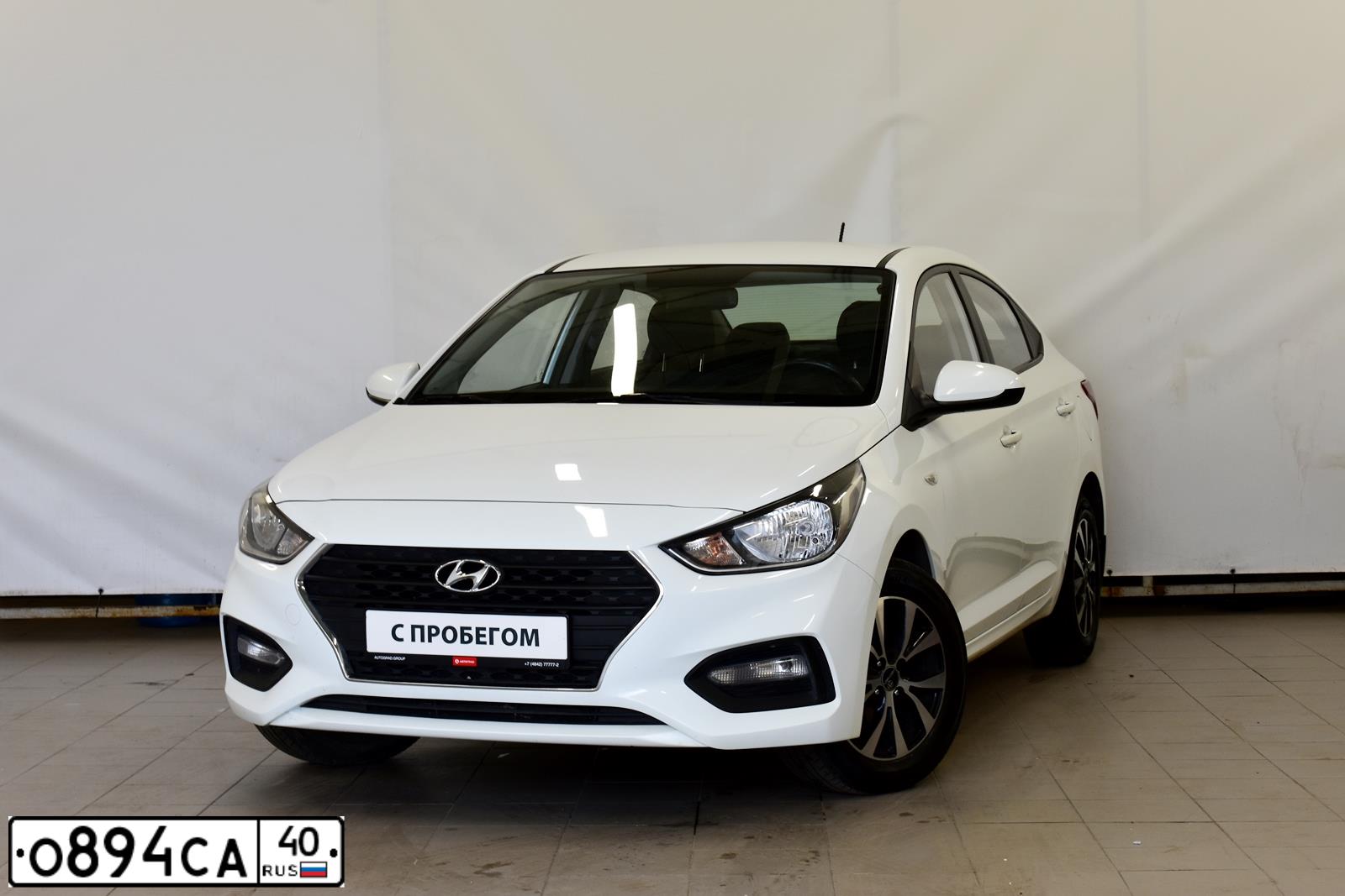 Фото автомобиля HYUNDAI SOLARIS, 2019 — госномер О894СА40. Цвет: БЕЛЫЙ