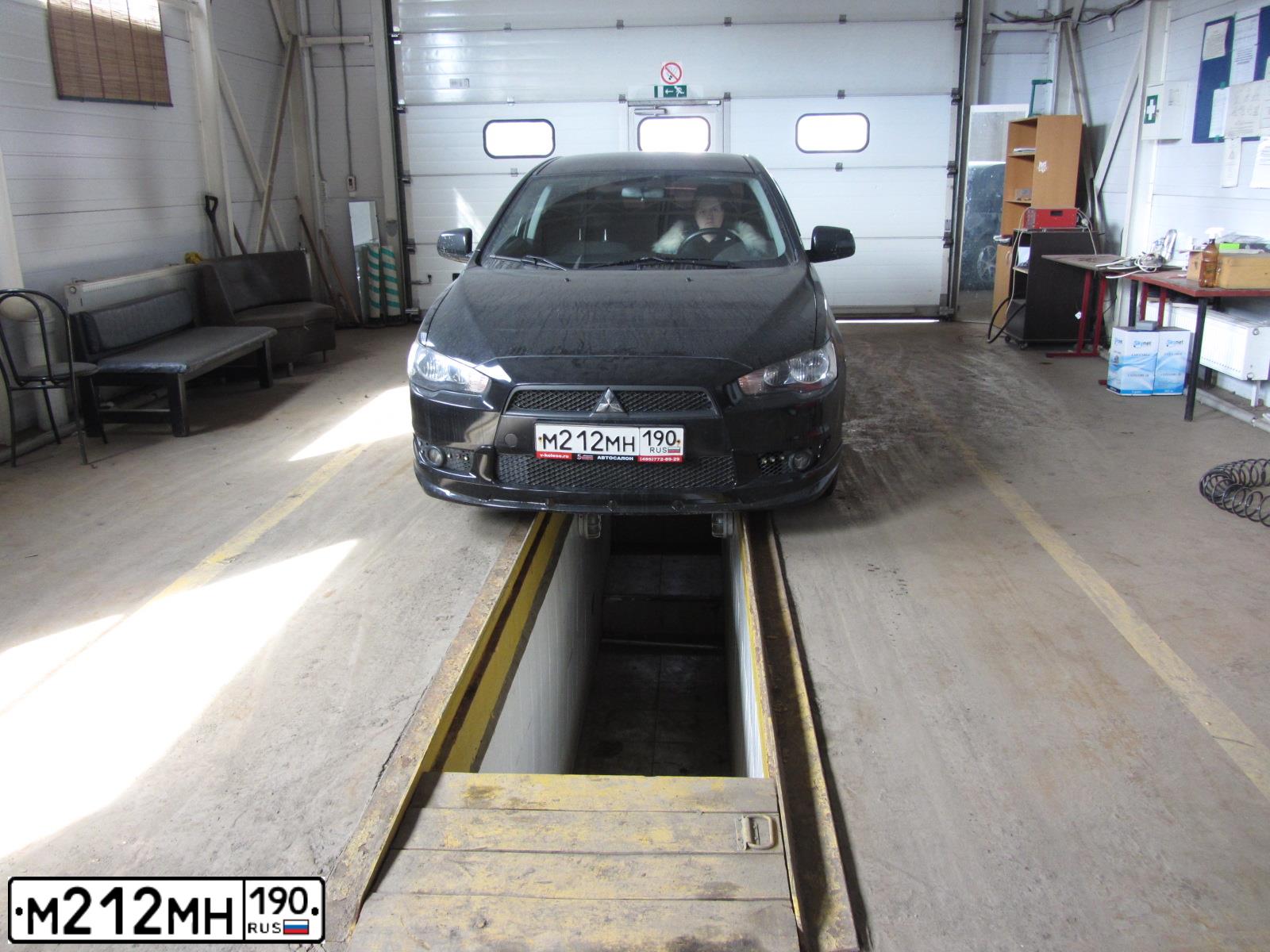 Фото автомобиля MITSUBISHI LANCER, 2010 — госномер М990УВ790. Цвет: ЧЕРНЫЙ