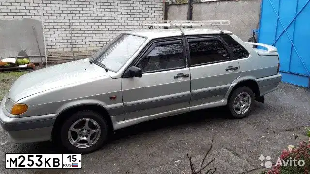 Фото автомобиля LADA 2115 SAMARA, 2000 — госномер М253КВ15. Цвет: СЕРЕБРИСТО-ЖЕЛТО-ЗЕЛЕНЫЙ
