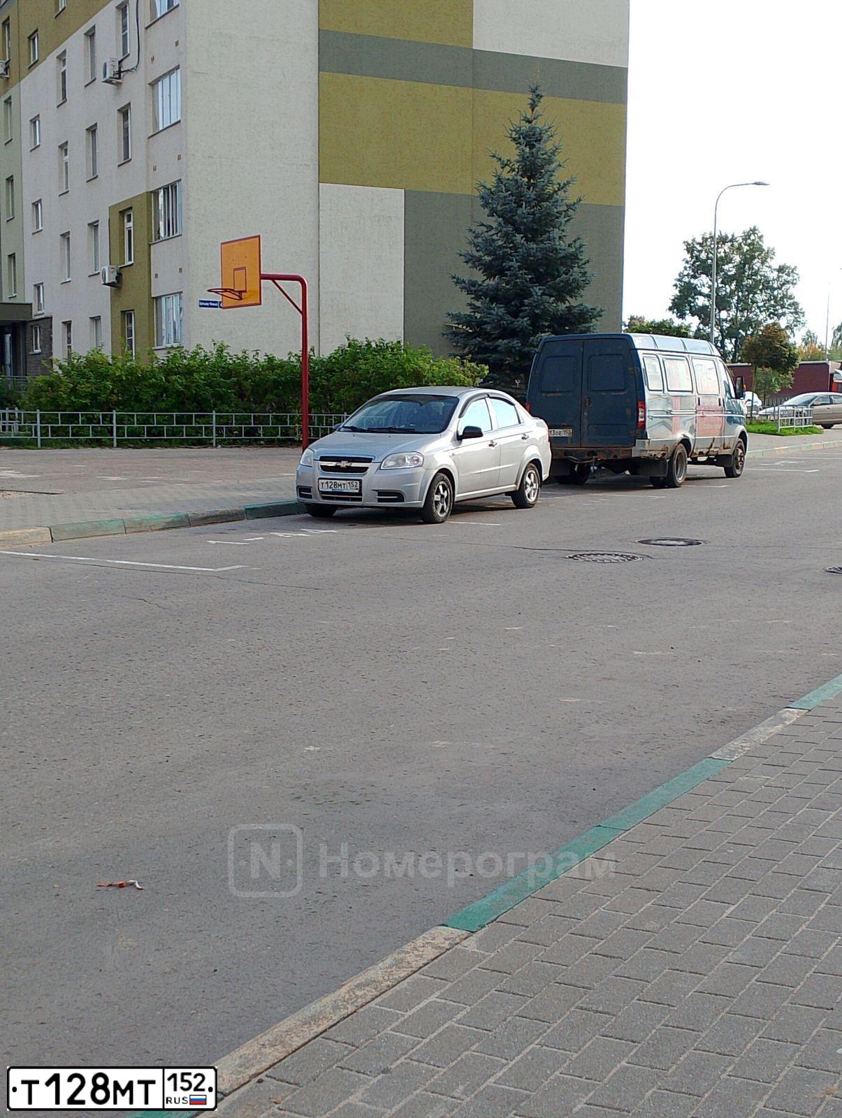Фото автомобиля CHEVROLET AVEO, 2009 — госномер Т128МТ152. Цвет: СЕРЕБРИСТЫЙ