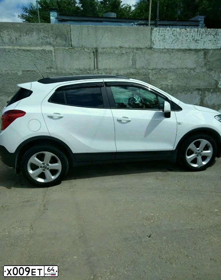 Фото автомобиля HYUNDAI TUCSON, 2017 — госномер Х009ЕТ64. Цвет: КОРИЧНЕВЫЙ