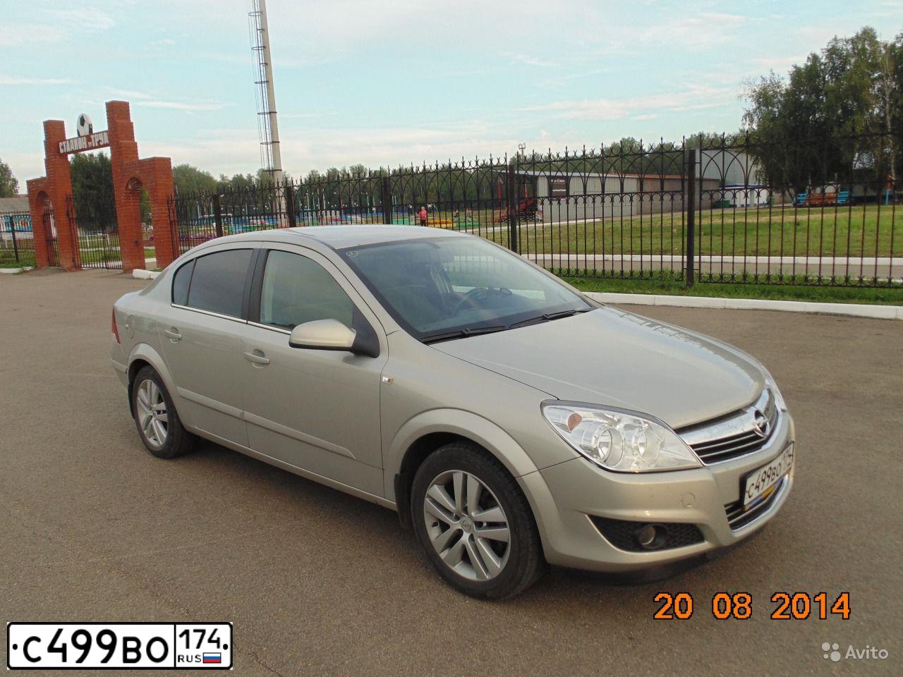 Фото автомобиля OPEL ASTRA, 2008 — госномер С499ВО174. Цвет: БЕЖЕВО-СЕРЫЙ