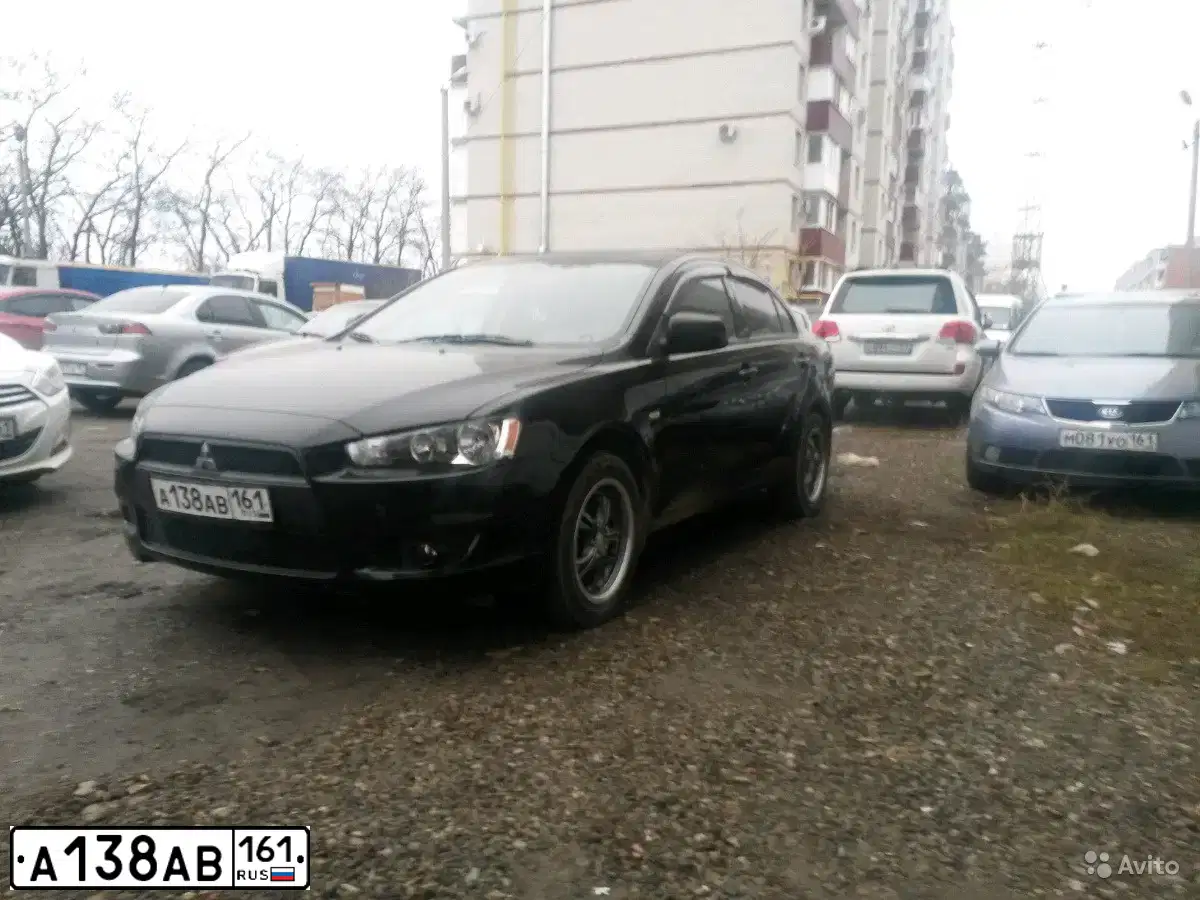 Фото автомобиля MITSUBISHI LANCER, 2007 — госномер А138АВ161. Цвет: ЧЕРНЫЙ