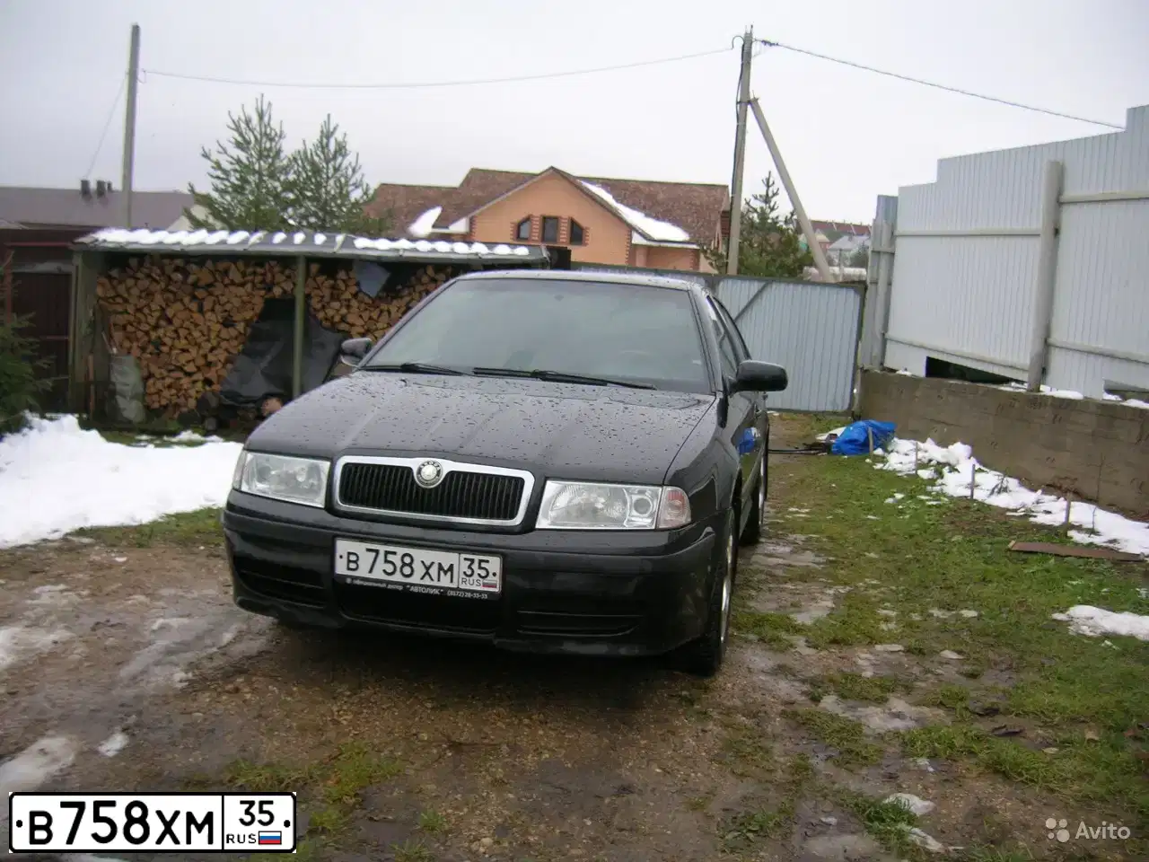 Фото автомобиля SKODA OCTAVIA, 2008 — госномер М552НТ35. Цвет: ЧЕРНЫЙ