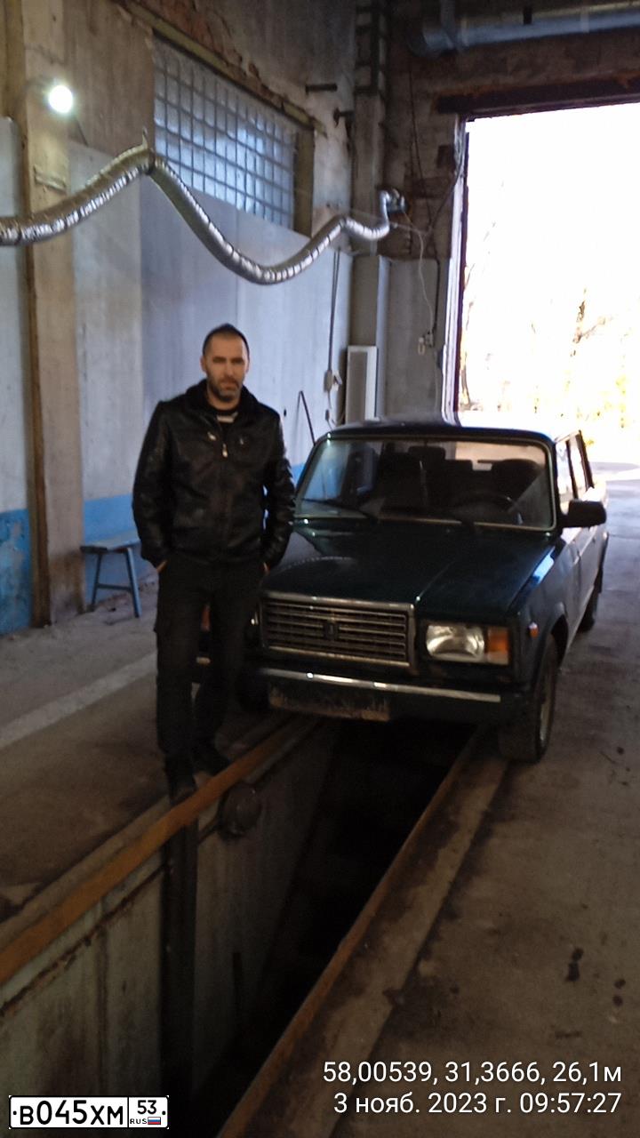 Фото автомобиля LADA 2107 LADA, 2007 — госномер К499КР53. Цвет: Темно-зеленый
