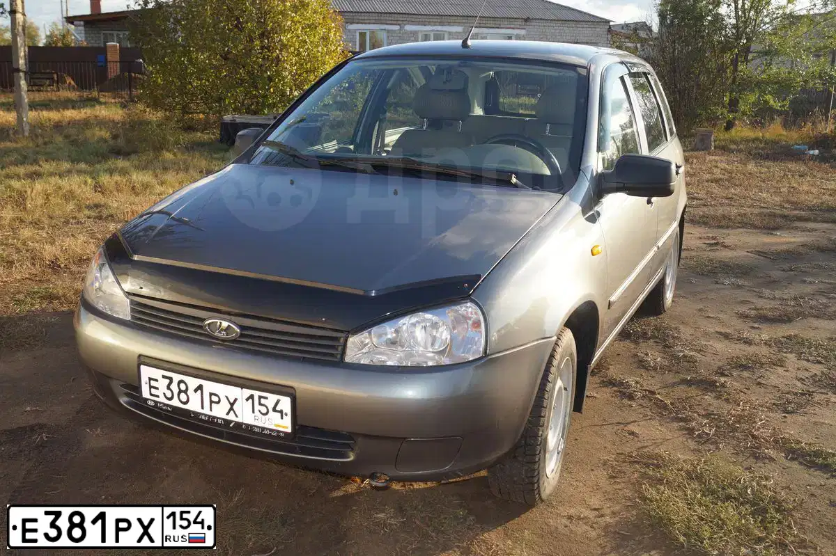 Фото автомобиля LADA 1117 KALINA, 2011 — госномер Е624КВ122. Цвет: ТЕМНО СЕРЫЙ МЕТАЛЛИК