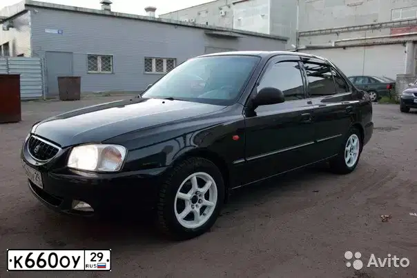 Фото автомобиля TAGAZ Z ACCENT, 2004 — госномер К660ОУ29. Цвет: ЧЕРНЫЙ