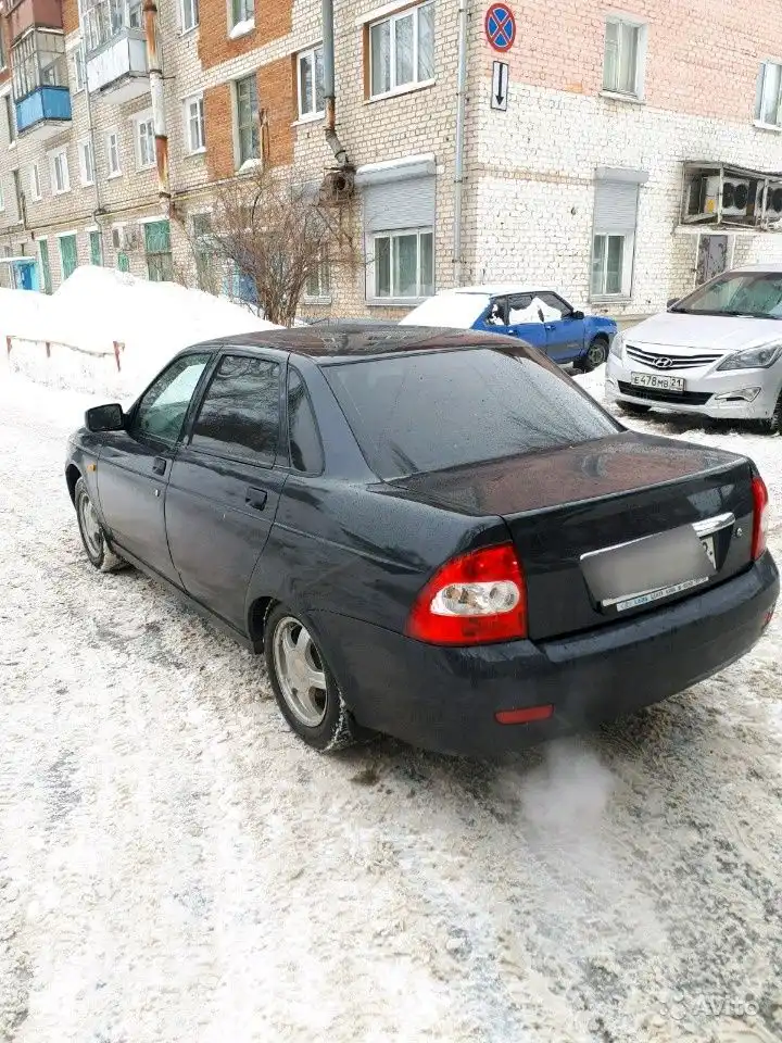 Фото автомобиля HYUNDAI SOLARIS, 2014 — госномер Е478МВ21. Цвет: серебристый