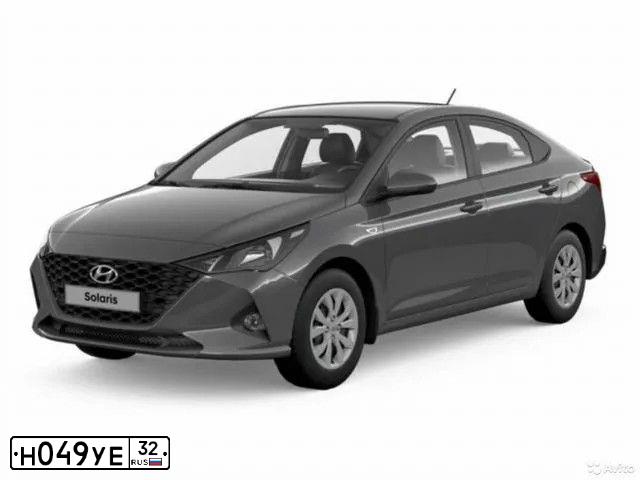 Фото автомобиля HYUNDAI SOLARIS, 2021 — госномер Н049УЕ32. Цвет: СЕРЫЙ