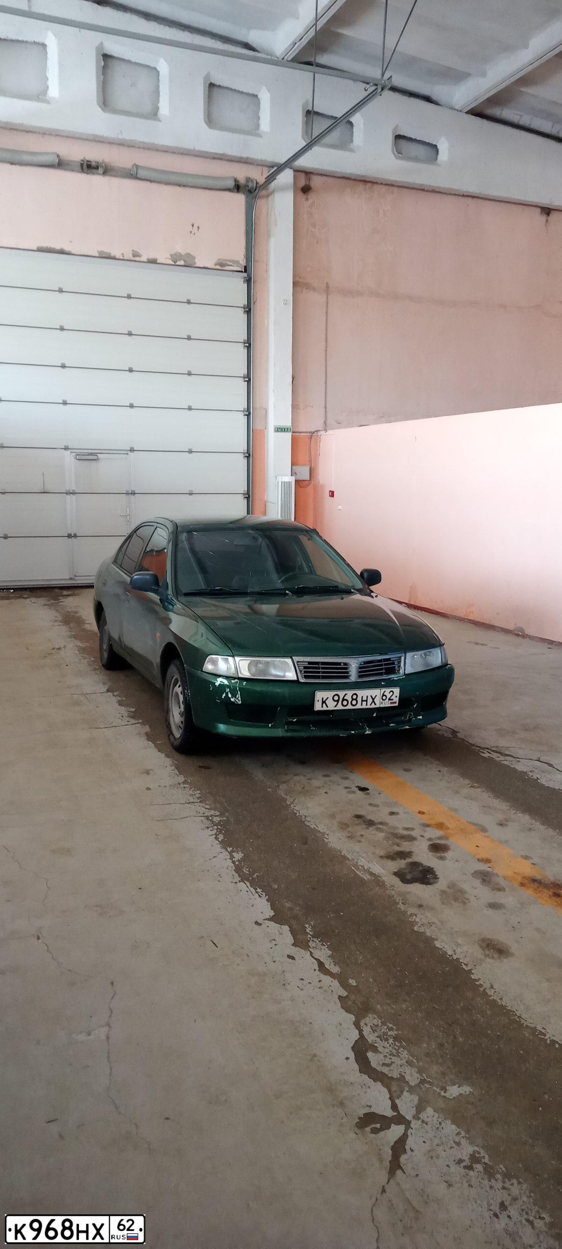 Фото автомобиля MITSUBISHI LANCER, 1999 — госномер М252НР134. Цвет: ЗЕЛЕНЫЙ