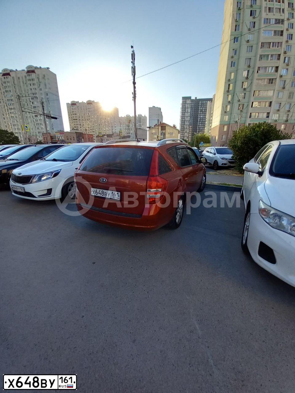 Фото автомобиля KIA CEE'D, 2008 — госномер Х648ВУ161. Цвет: КРАСНЫЙ