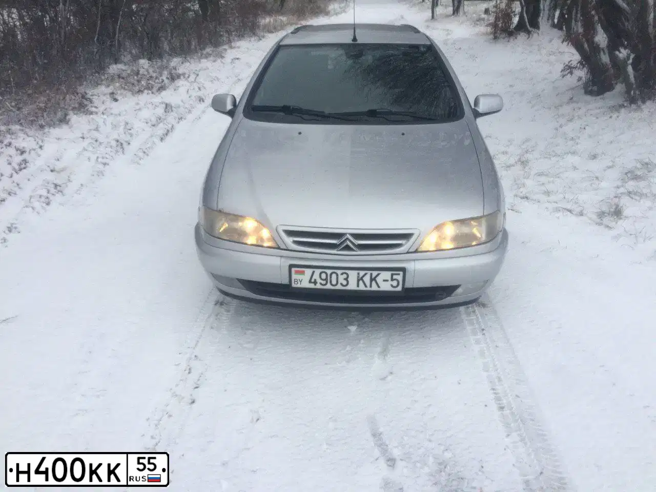 Фото автомобиля GAZ 3110 WOLGA, 1998 — госномер Е275УК55. Цвет: СЕРЫЙ