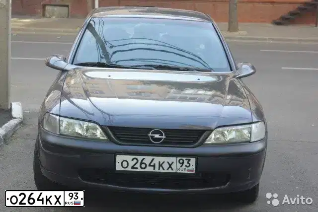 Фото автомобиля OPEL VECTRA, 1997 — госномер О264КХ93. Цвет: ФИОЛЕТОВЫЙ