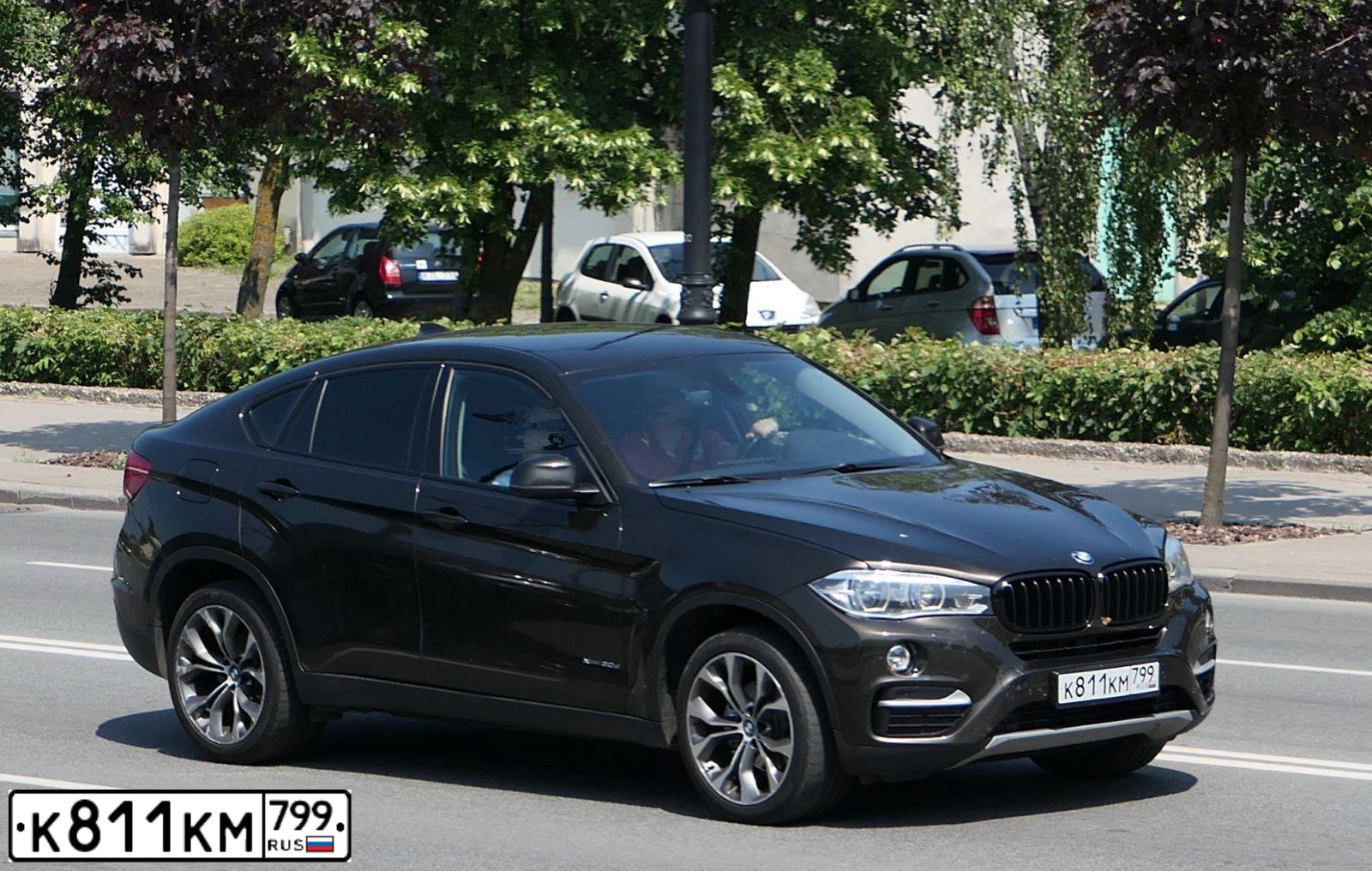 Фото автомобиля BMW X6, 2015 — госномер Е869КР136. Цвет: Коричневый