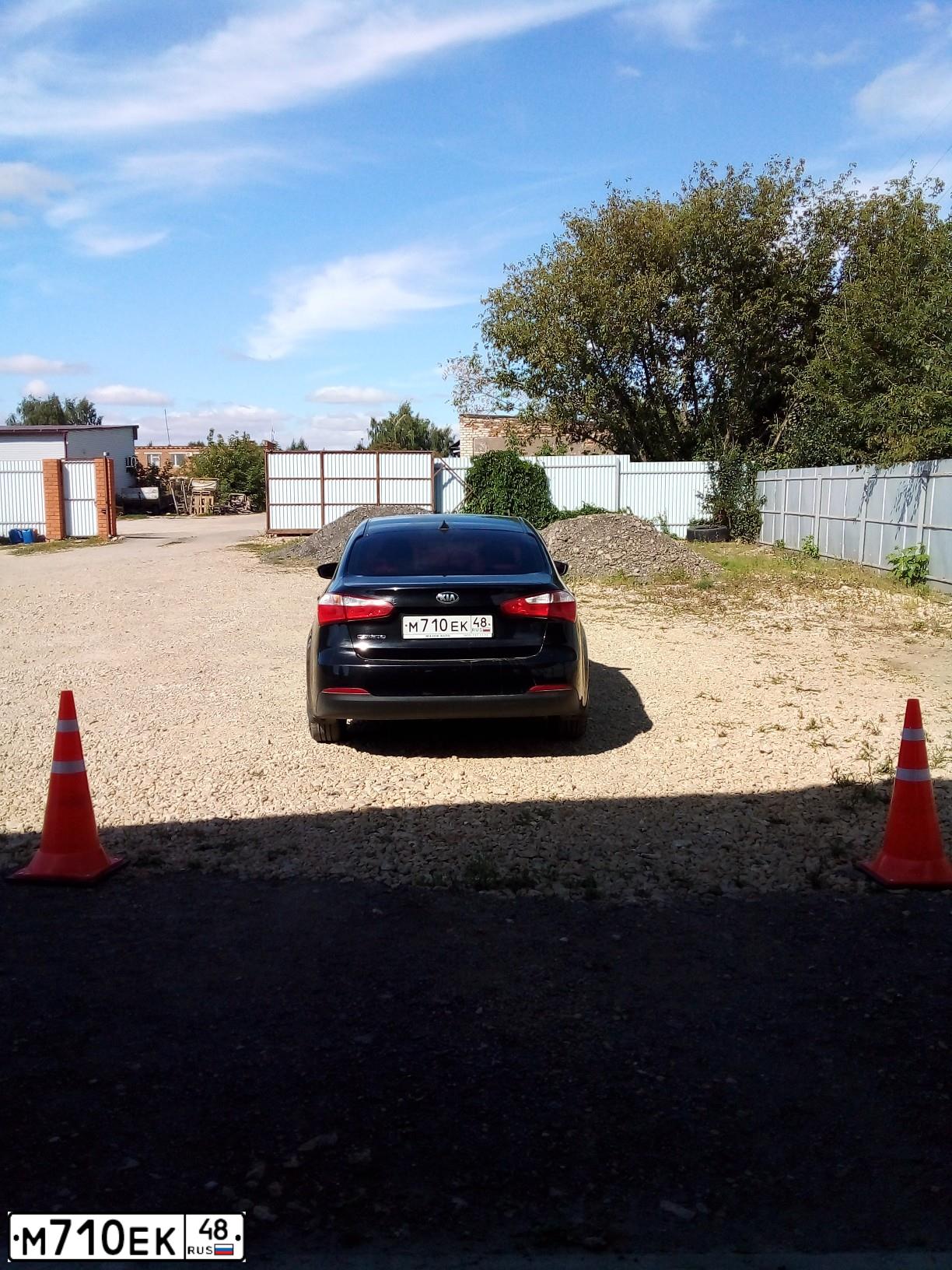 Фото автомобиля KIA CERATO, 2014 — госномер М710ЕК48. Цвет: ЧЕРНЫЙ