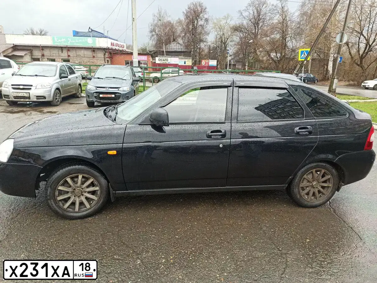 Фото автомобиля CHEVROLET AVEO, 2008 — госномер Х231ХА18. Цвет: Серебристый