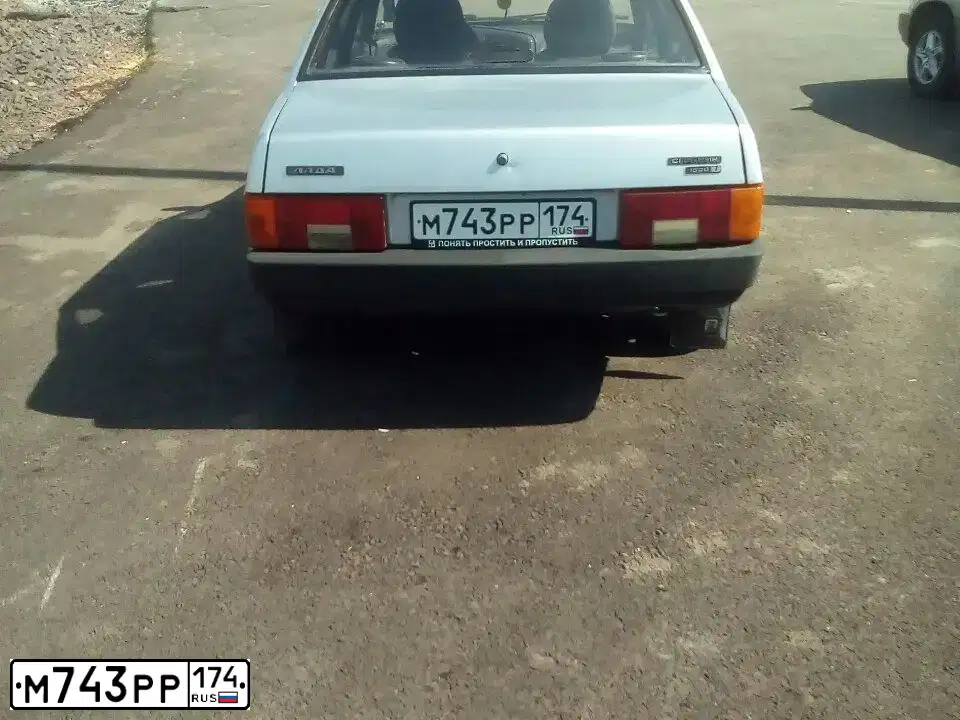 Фото автомобиля LADA 2109 SAMARA, 2002 — госномер М473НР702. Цвет: СВЕТЛО-СЕРЫЙ