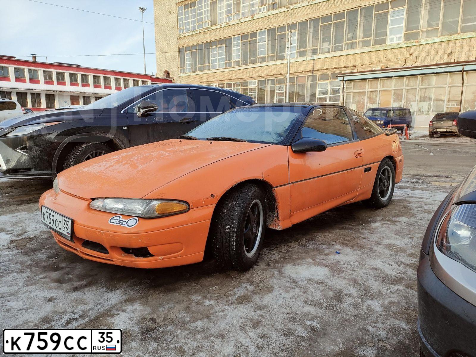 Фото автомобиля CHRYSLER EAGLE, 1992 — госномер К759СС35. Цвет: ОРАНЖЕВЫЙ ЧЕРНЫЙ