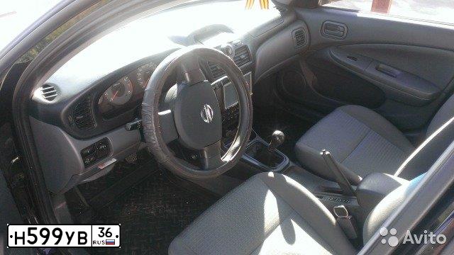 Фото автомобиля NISSAN ALMERA, 2007 — госномер Е692ЕЕ36. Цвет: ЧЕРНЫЙ