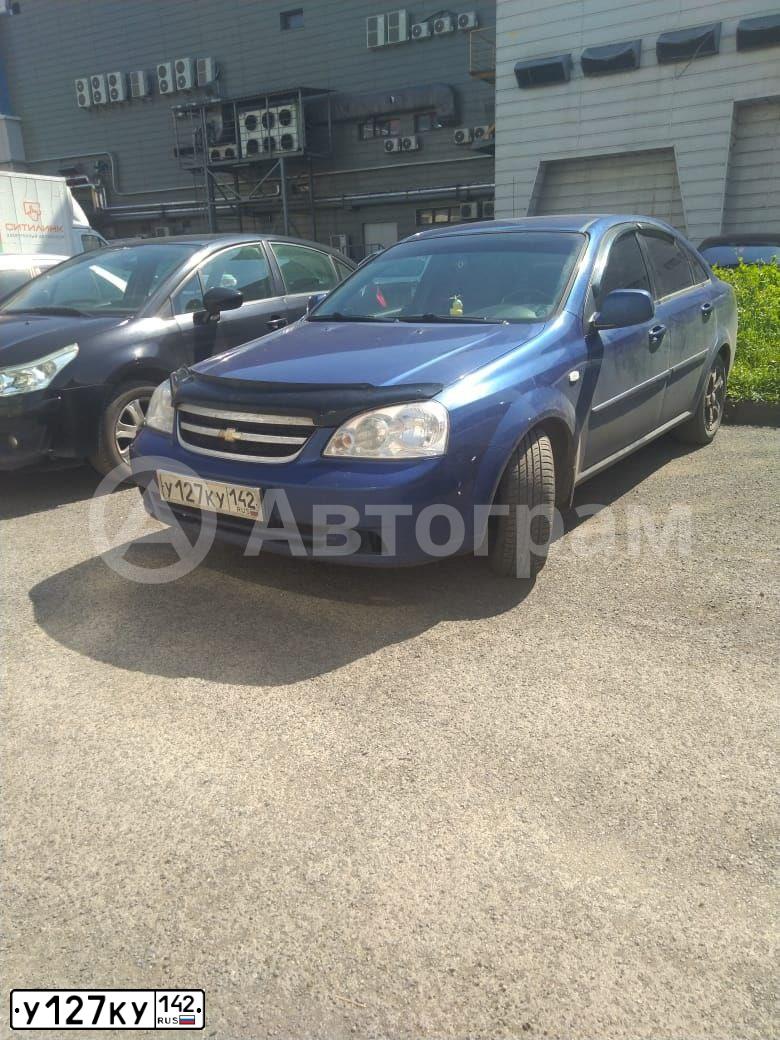 Фото автомобиля CHEVROLET LACETTI, 2011 — госномер Е854НТ164. Цвет: синий
