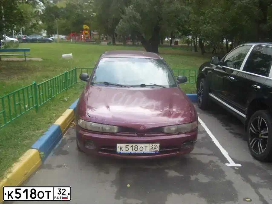 Фото автомобиля MITSUBISHI GALANT, 1995 — госномер К916ЕА777. Цвет: КРАСНЫЙ ТЕМНЫЙ