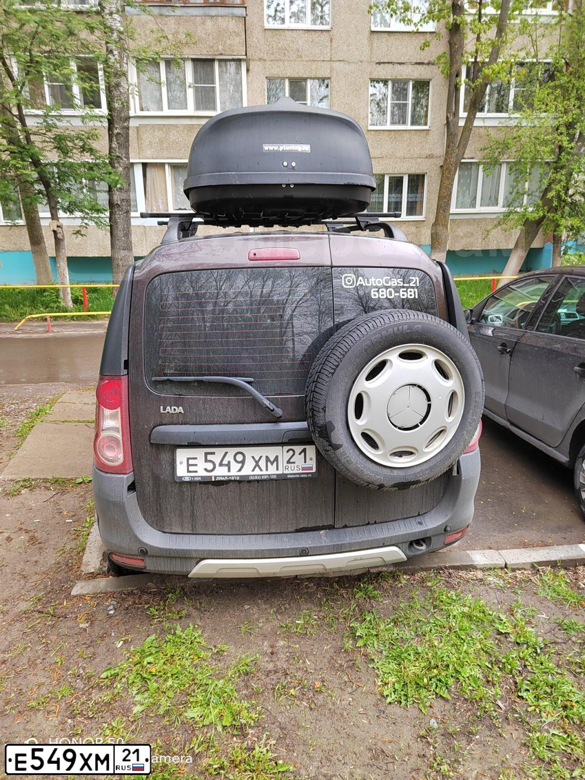Фото автомобиля LADA LARGUS, 2018 — госномер Е549ХМ21. Цвет: ТЕМНО-КОРИЧНЕВЫЙ