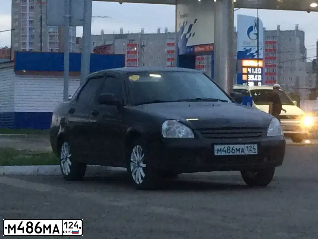 Фото автомобиля LADA PRIORA, 2011 — госномер Х405РР124. Цвет: ЧЕРНЫЙ