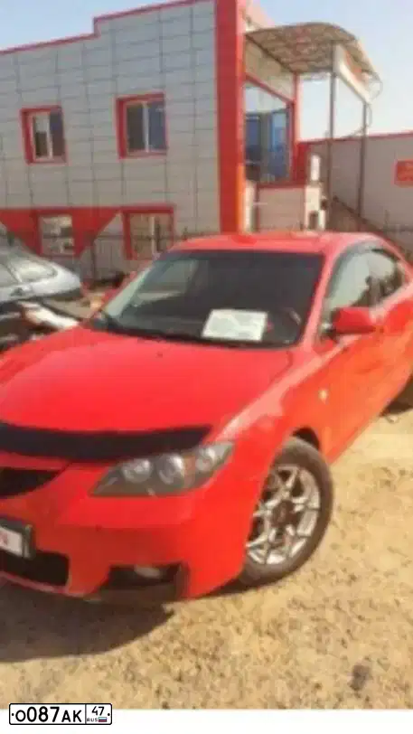 Фото автомобиля MAZDA 3, 2007 — госномер О374ВН159. Цвет: Красный
