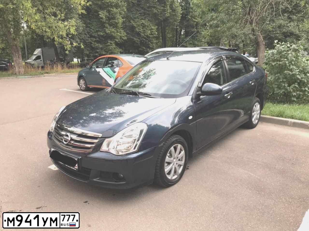 Фото автомобиля NISSAN ALMERA /AVTOVAZ/, 2016 — госномер М941УМ777. Цвет: ЧЕРНЫЙ