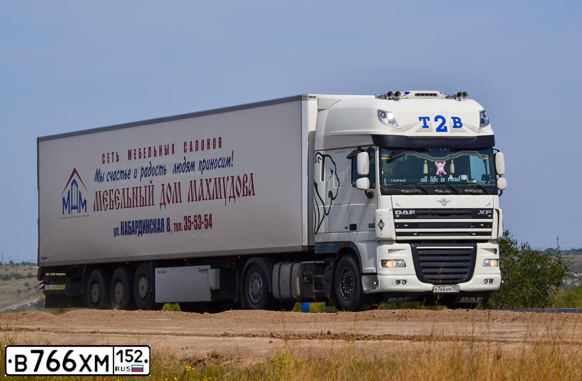 Фото автомобиля DAF XF 105 FT /4X2/, 2010 — госномер Х666МУ30. Цвет: МНОГОЦВЕТНЫЙ