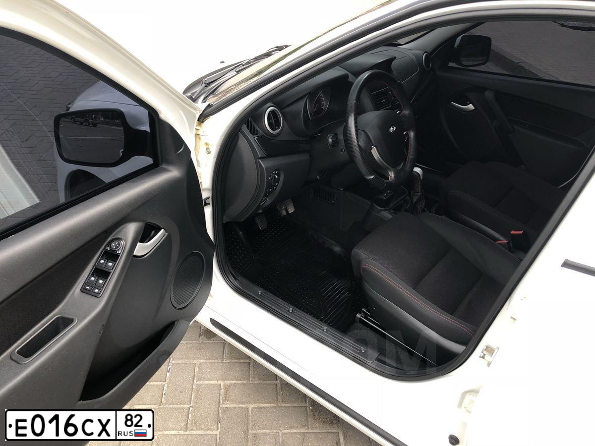 Фото автомобиля BMW X1, 2016 — госномер Е016СХ82. Цвет: СИНИЙ