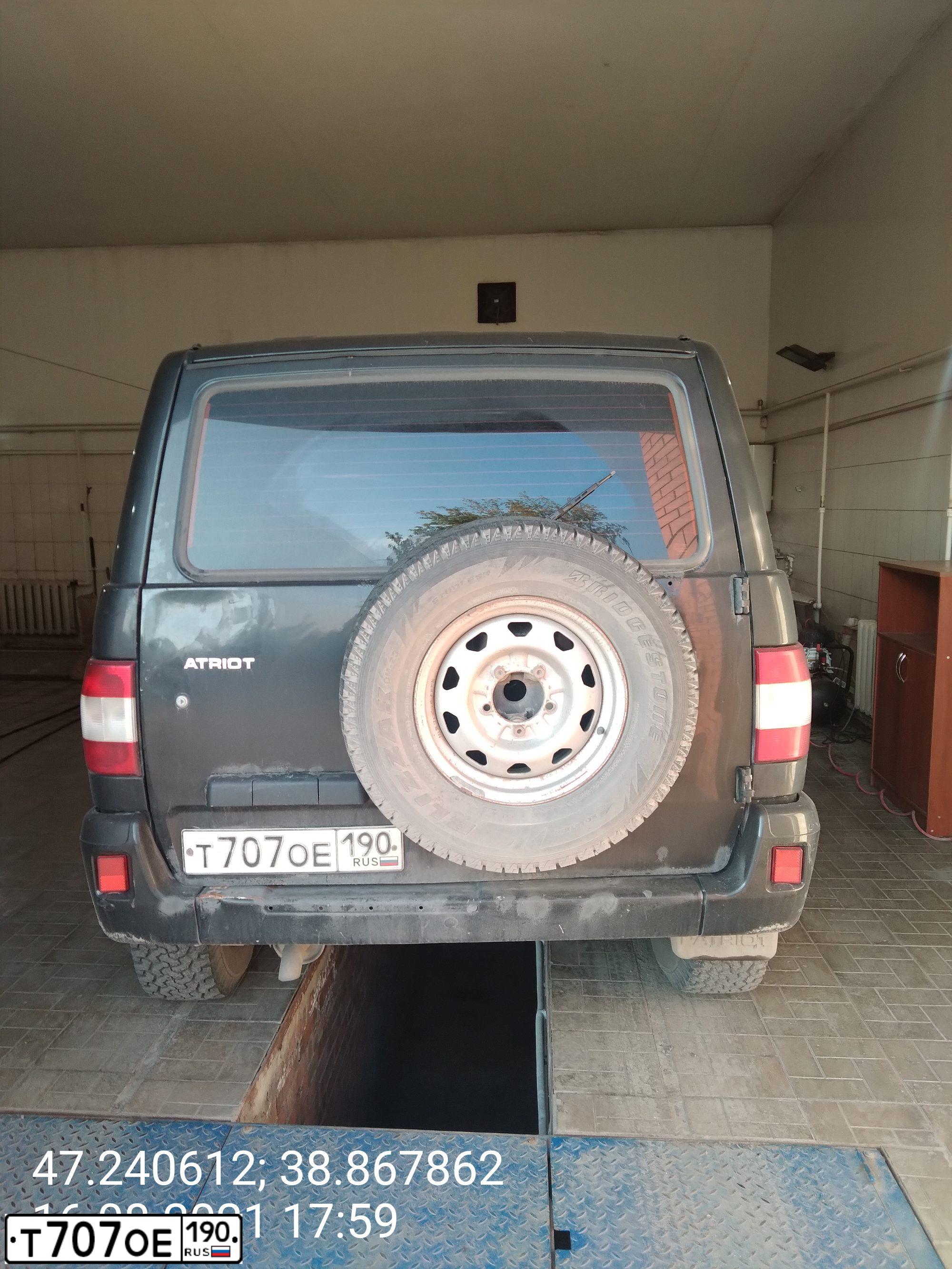 Фото автомобиля UAZ 3163 PATRIOT, 2008 — госномер Т707ОЕ190. Цвет: ЧЕРНЫЙ