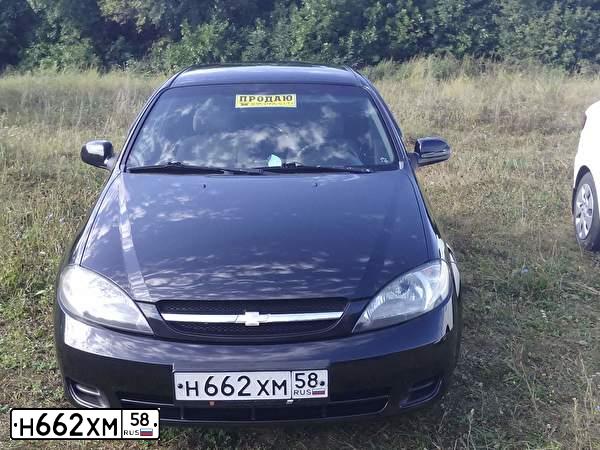 Фото автомобиля CHEVROLET LACETTI, 2008 — госномер А371УЕ164. Цвет: ЧЕРНЫЙ