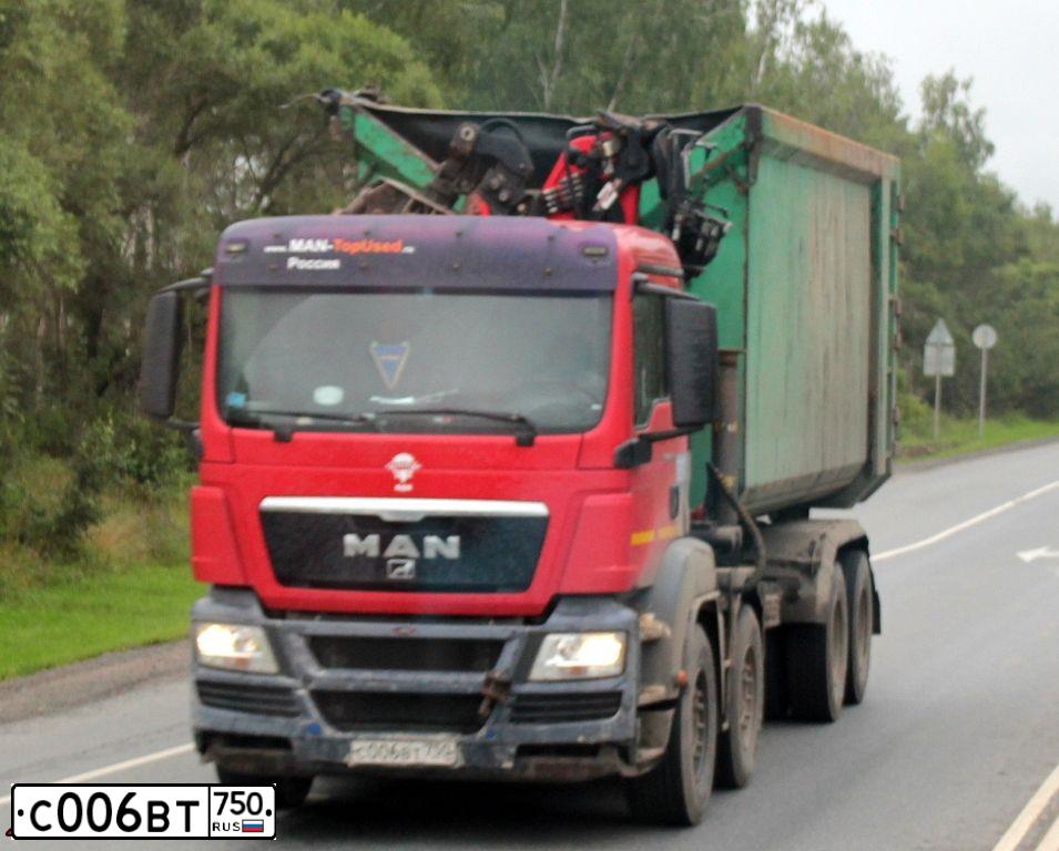 Фото автомобиля MAN TGS 41.XXX /8X4/, 2011 — госномер С006ВТ750. Цвет: ЗЕЛЕНЫЙ