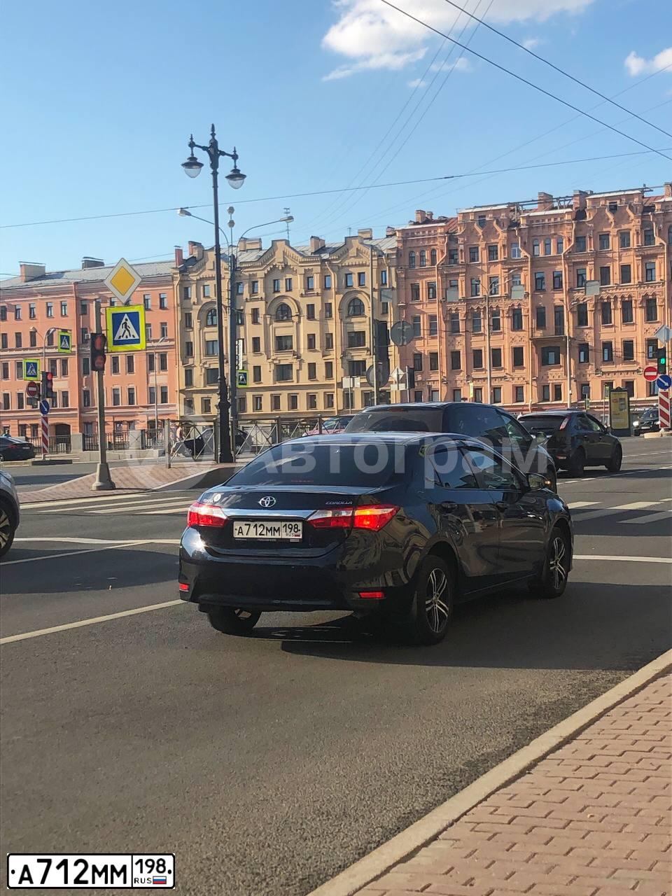 Фото автомобиля TOYOTA COROLLA, 2014 — госномер А712ММ198. Цвет: ТЕМНО-СЕРЫЙ
