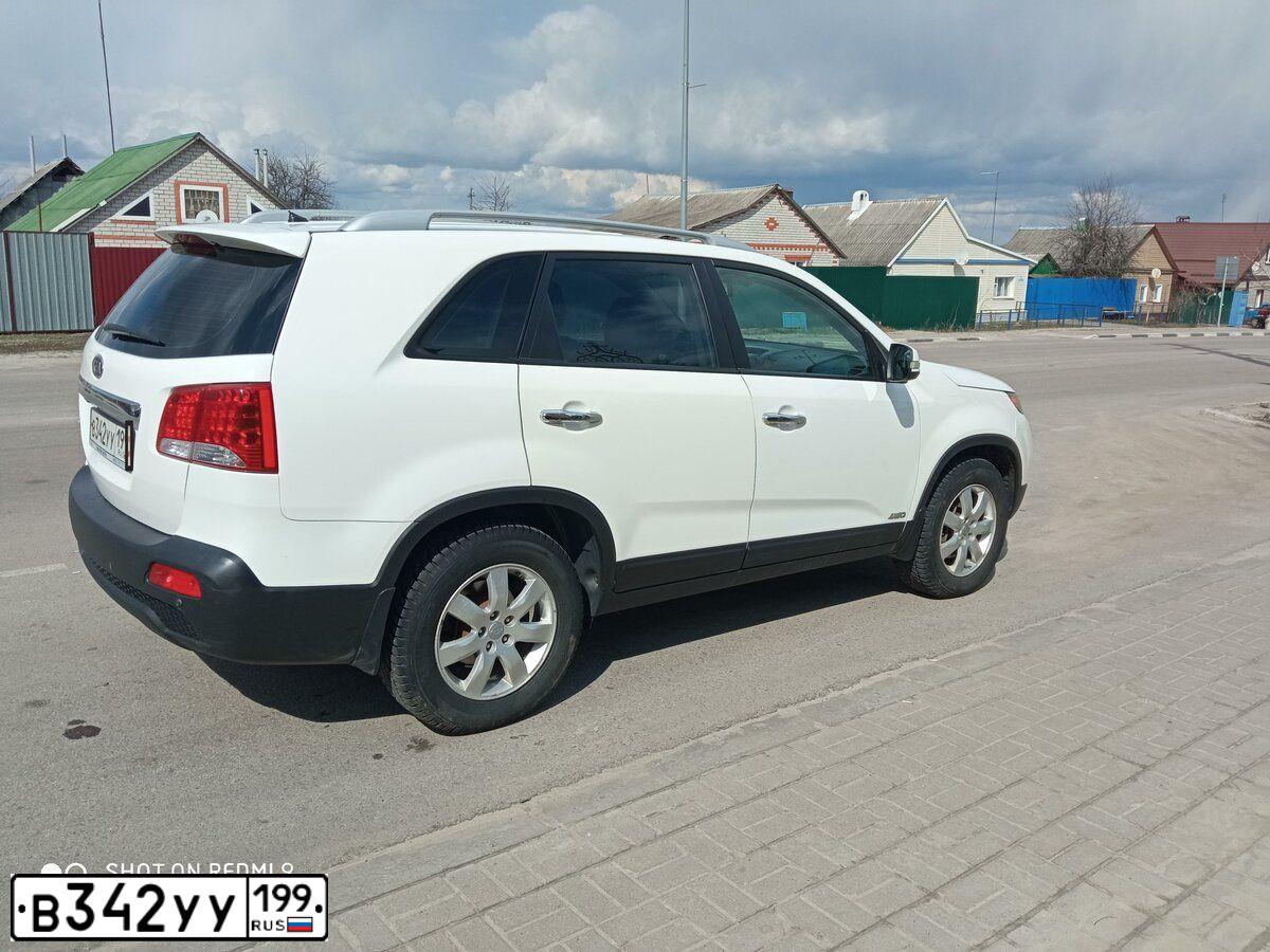 Фото автомобиля KIA SORENTO, 2009 — госномер У382НС71. Цвет: Белый