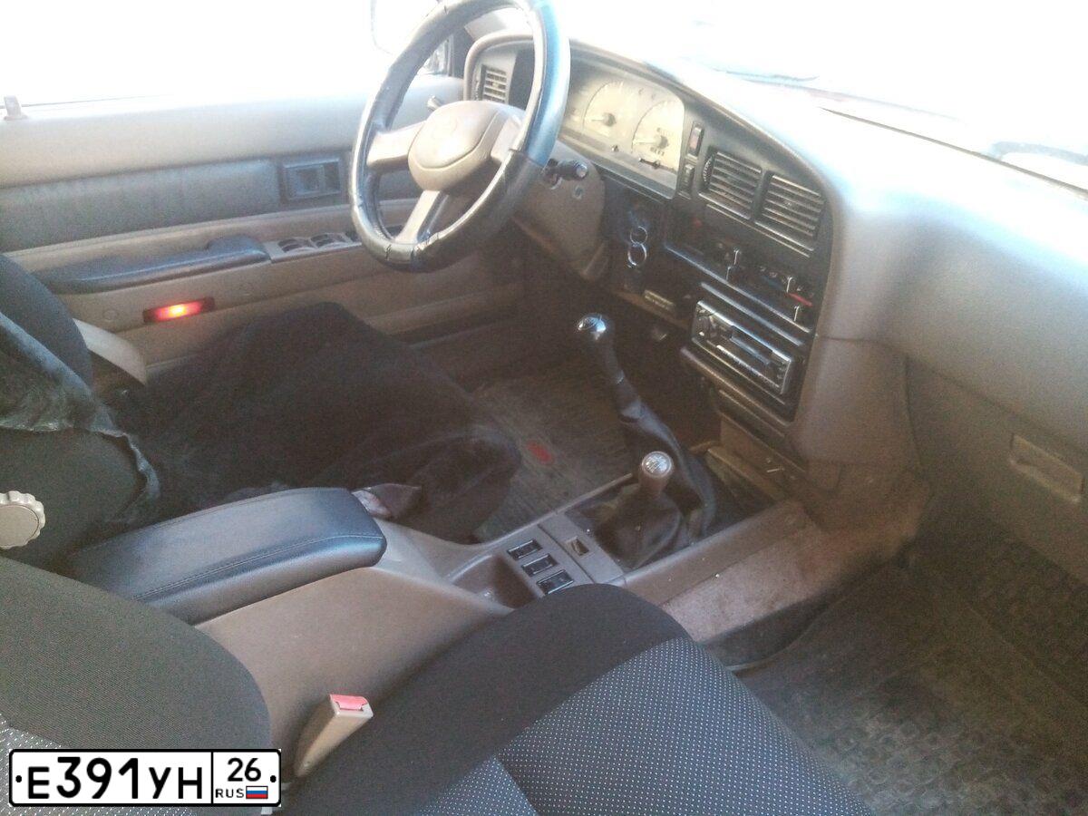 Фото автомобиля TOYOTA ТОЙОТА 4RUNNЕR, 1994 — госномер Е891УН26. Цвет: КРАСНЫЙ МЕТАЛЛИК