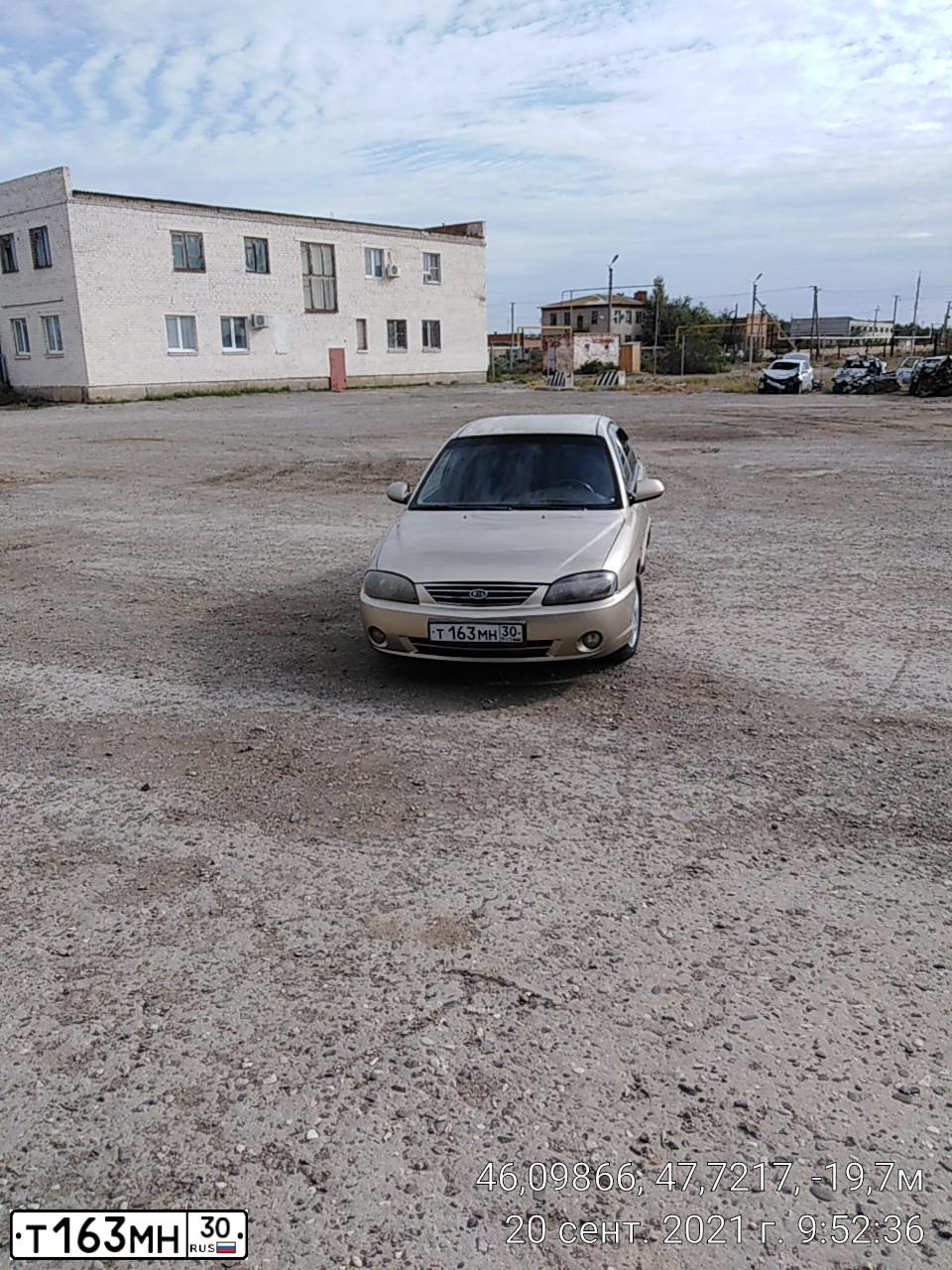 Фото автомобиля KIA SPECTRA, 2008 — госномер У248РМ23. Цвет: Золотисто-бежевый