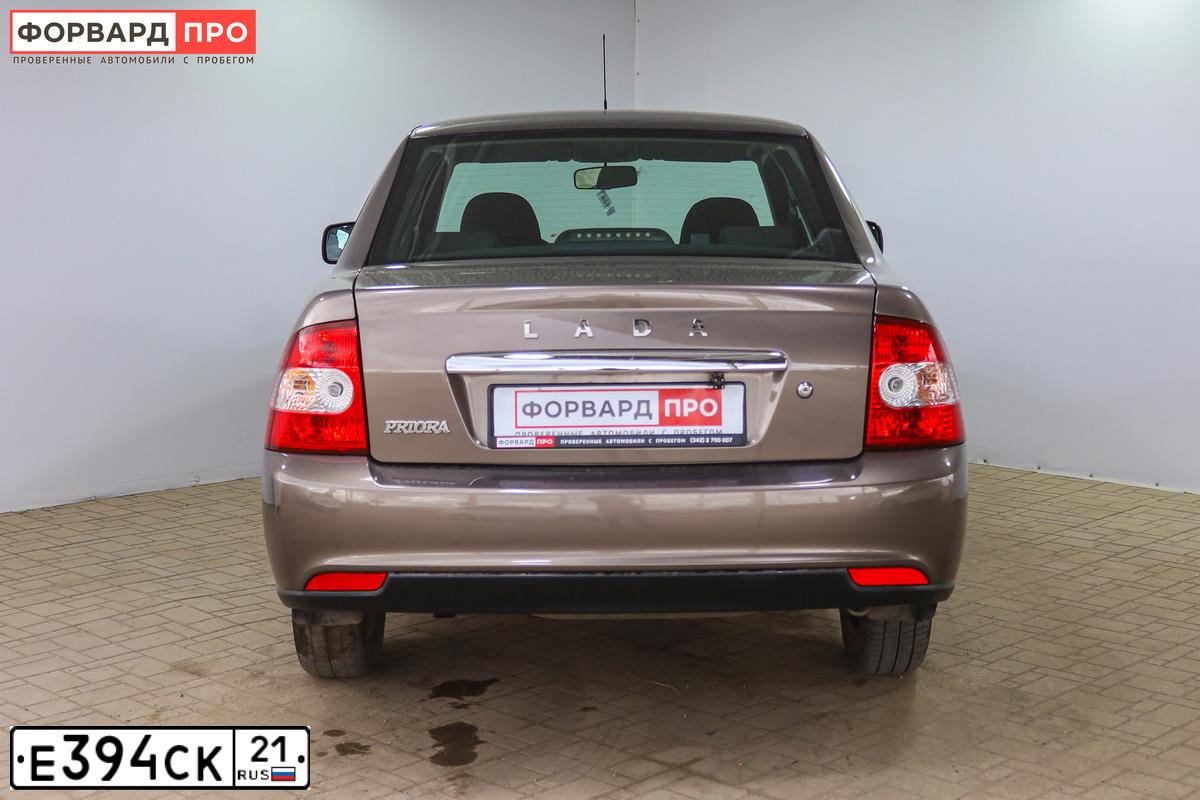 Фото автомобиля LADA 2170 PRIORA, 2016 — госномер Е394СК21. Цвет: Золотисто-коричневый